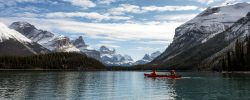 tourists-canoeing-into-the-spirit-island-on-maligne-lake-at-jasper-national-park-canada.jpg